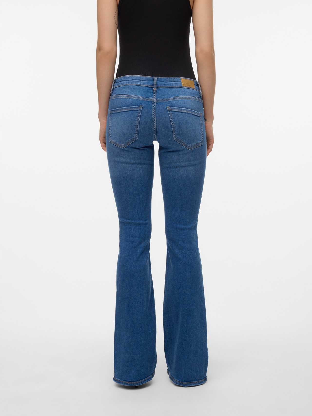 Vero Moda skinny cropped kick flare jeans in washed black Vero Moda skinny cropped kick flare jeans in washed black